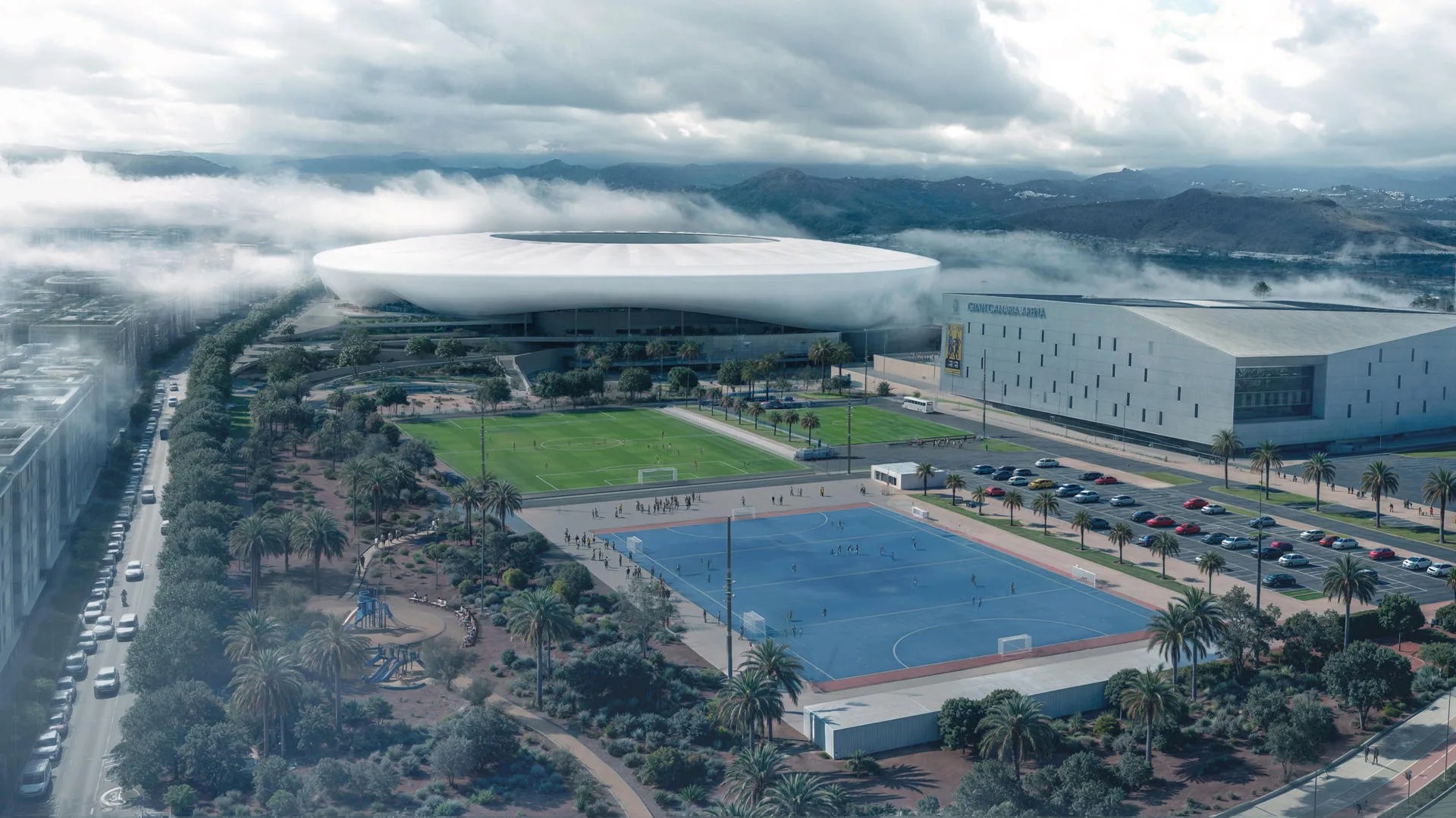 Simulación gráfica de cómo quedará el estadio (al fondo), junto al Gran Canaria Arena (d), facilitada por el Cabildo. EFE
