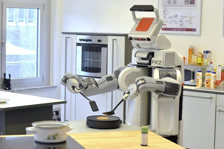 Imagen de archivo de un robot utilizando Inteligencia Artificial.