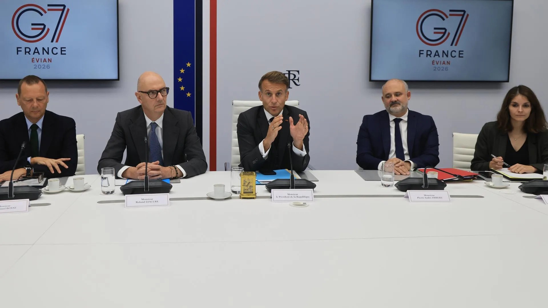 French President Emmanuel Macron (C) speaks next to Presidential advisor Emmanuel Bonne (L), Economy, Finances and Industry Minister Roland Lescure, Secretary-General of the Office of the President of the French Republic Pierre-Andre Imbert (2-R) and councillor Camille Morfouace de Broucker following a videoconference with G7 leaders at the Elysee Presidential Palace in Paris, France, 02 October 2026. EFE-EPA/LUDOVIC MARIN / POOL MAXPPP OUT