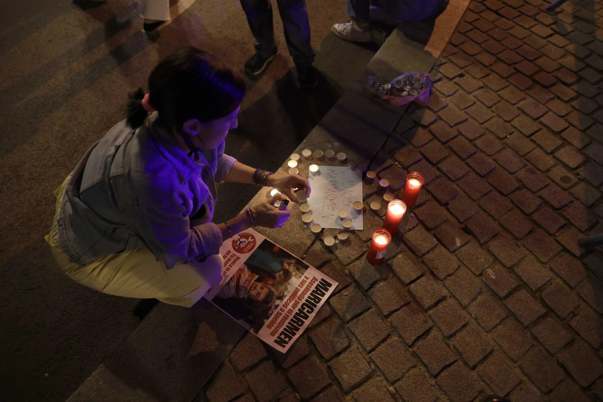 Cedaceros Street, next to the Congress of Deputies in Madrid, as people gathered to express their condolences for the death of Maricarmen, the 87-year-old woman who was evicted on Sep. 23 in Madrid and whose case sparked the protests over the housing crisis. Oct. 07, 2026. EFE/Juanjo Martín