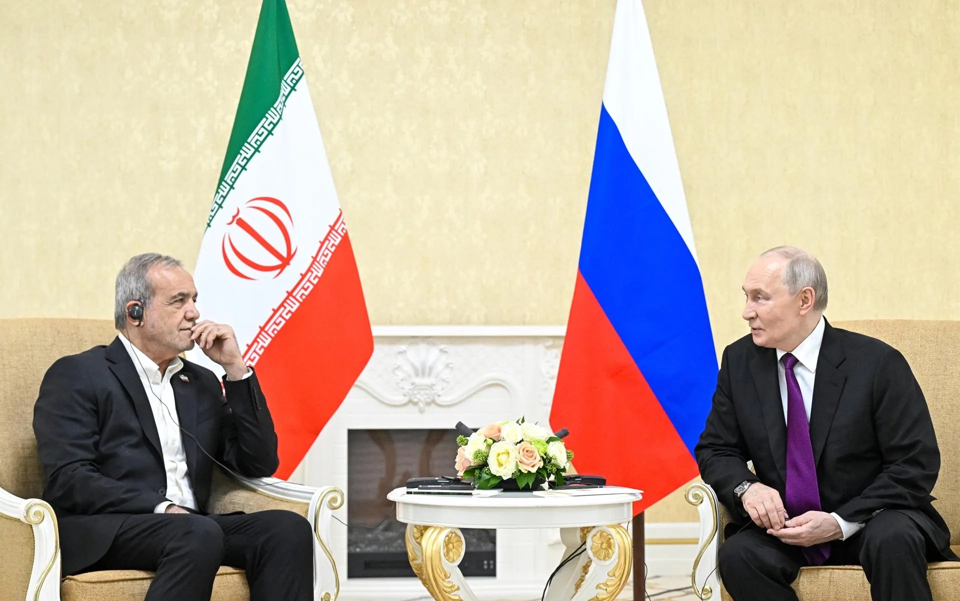 Iranian President Masoud Pezeshkian (L) and Russian President Vladimir Putin (R) talk during a meeting in Turkmenbashi, Turkmenistan. Oct. 08, 2026. EFE/EPA/SERGEY BOBYLEV / SPUTNIK / KREMLIN POOL MANDATORY CREDIT