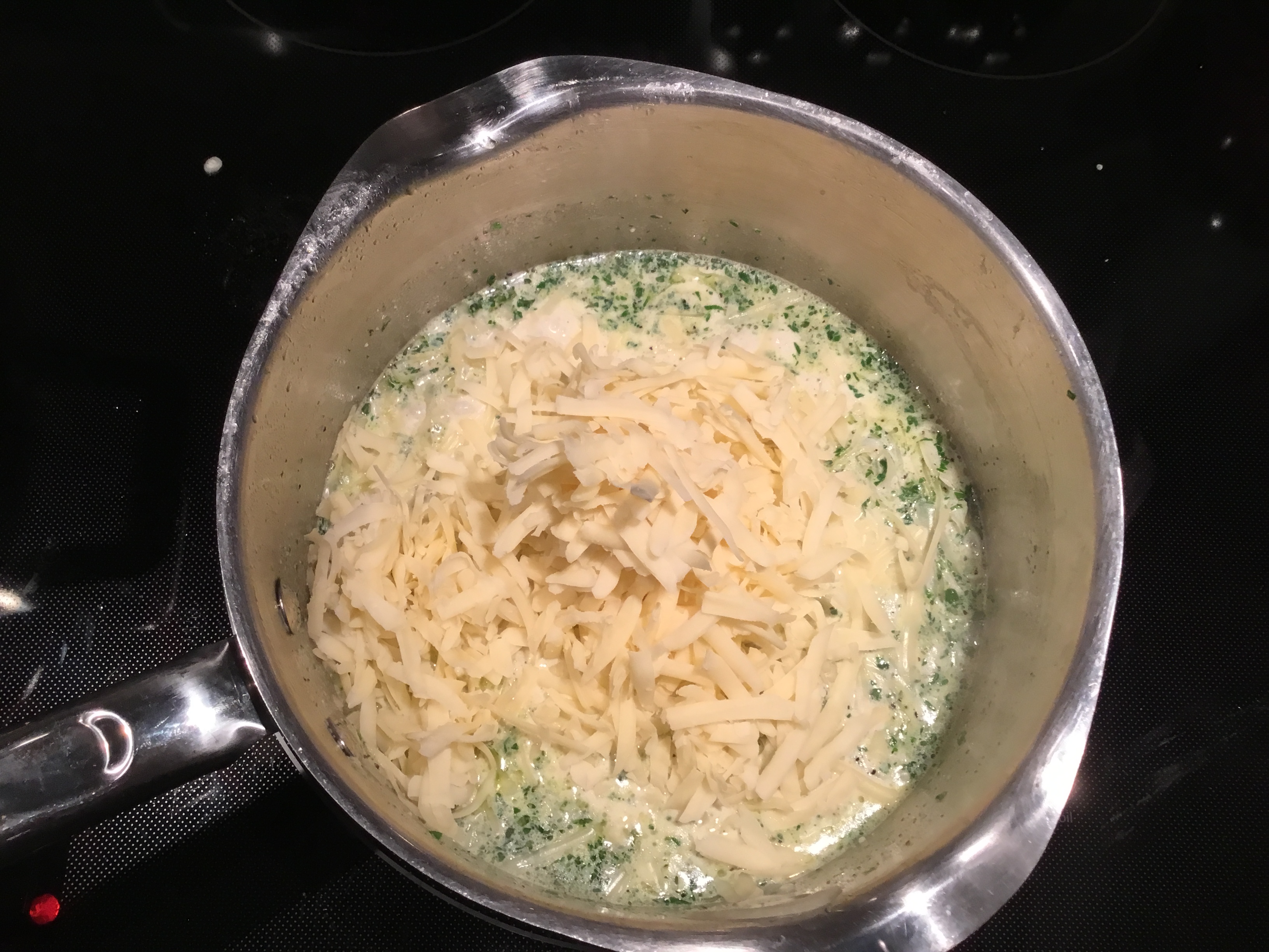 add the cheese, stir to melt