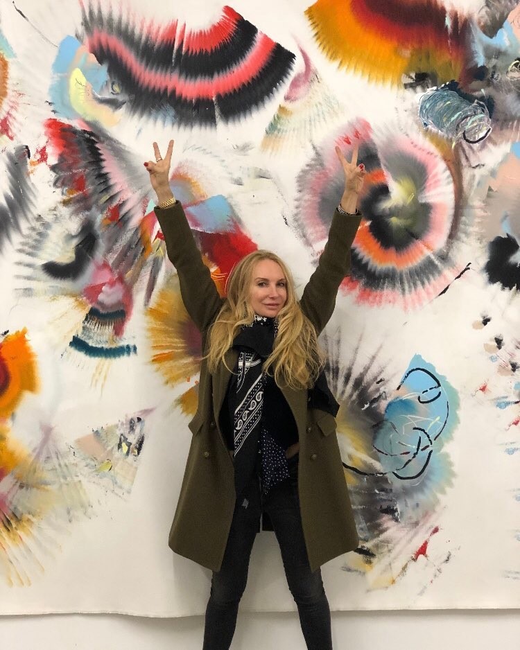 In front of my husband's art