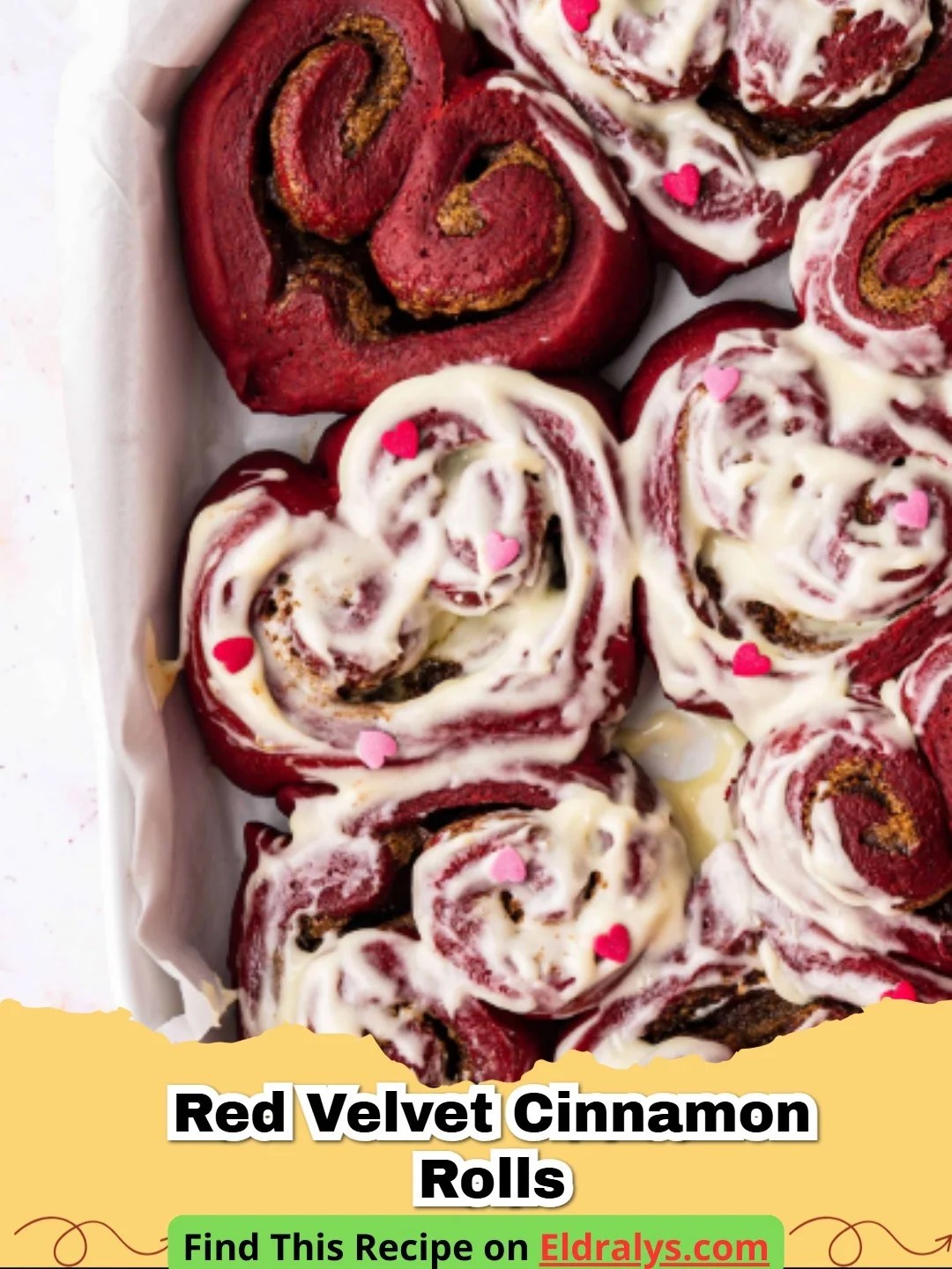 Red velvet cinnamon rolls topped with creamy vanilla glaze, soft and fluffy with rich red swirls