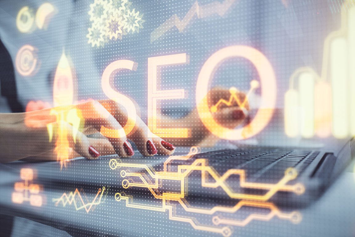 SEO optimization art with female typing on laptop keyboard