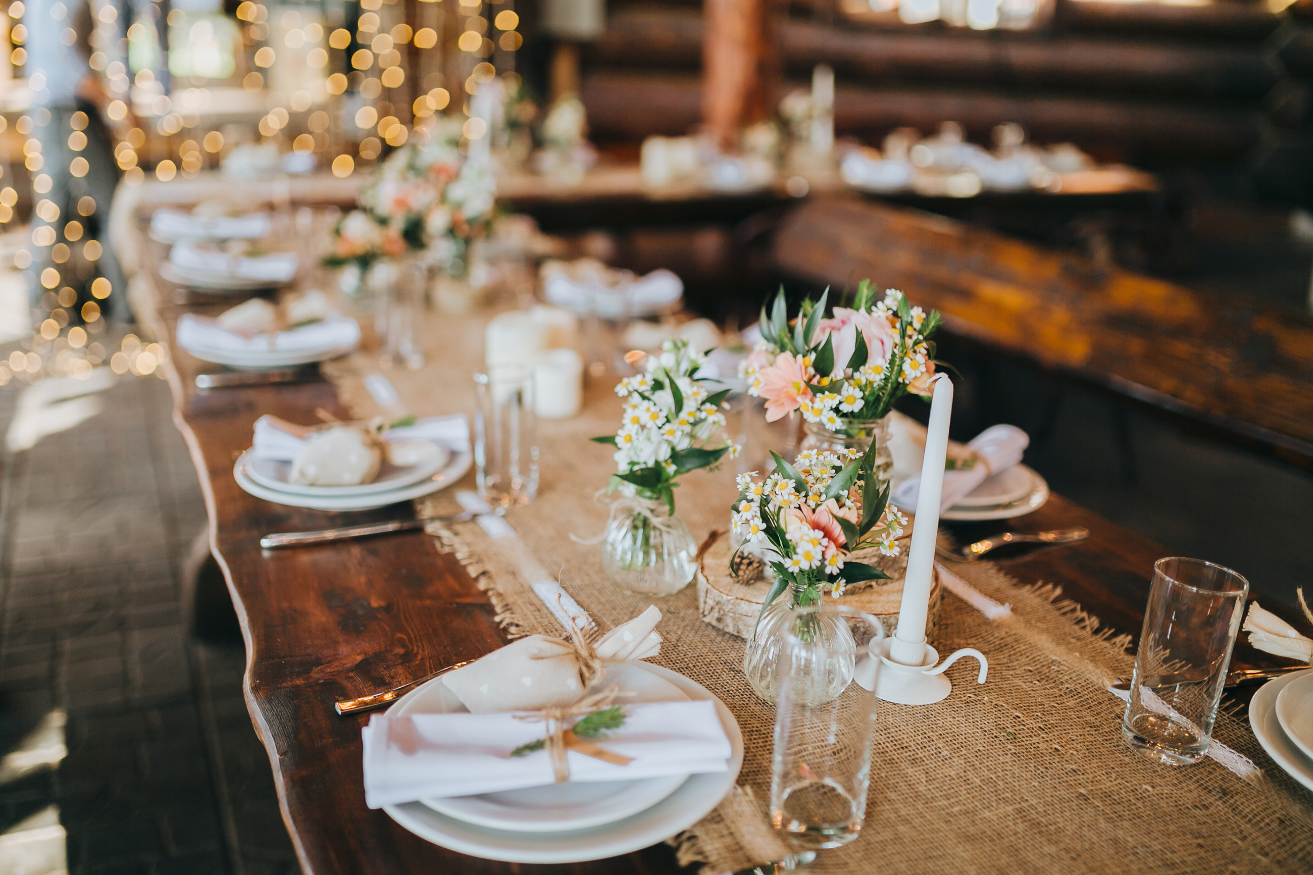 decorations made of wood and wildflowers served on the festive table