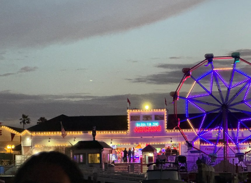 Balboa Fun Zone arcade and illuminated Ferris wheel at night