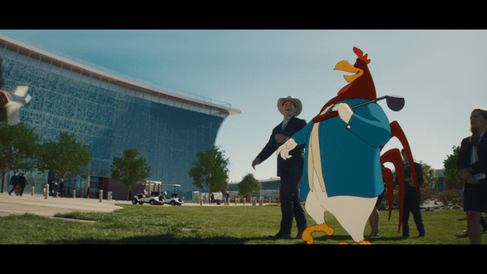 A cartoon rooster in a blue jacket holds a golf club next to a man in a cowboy hat, set against a modern building and green landscape.