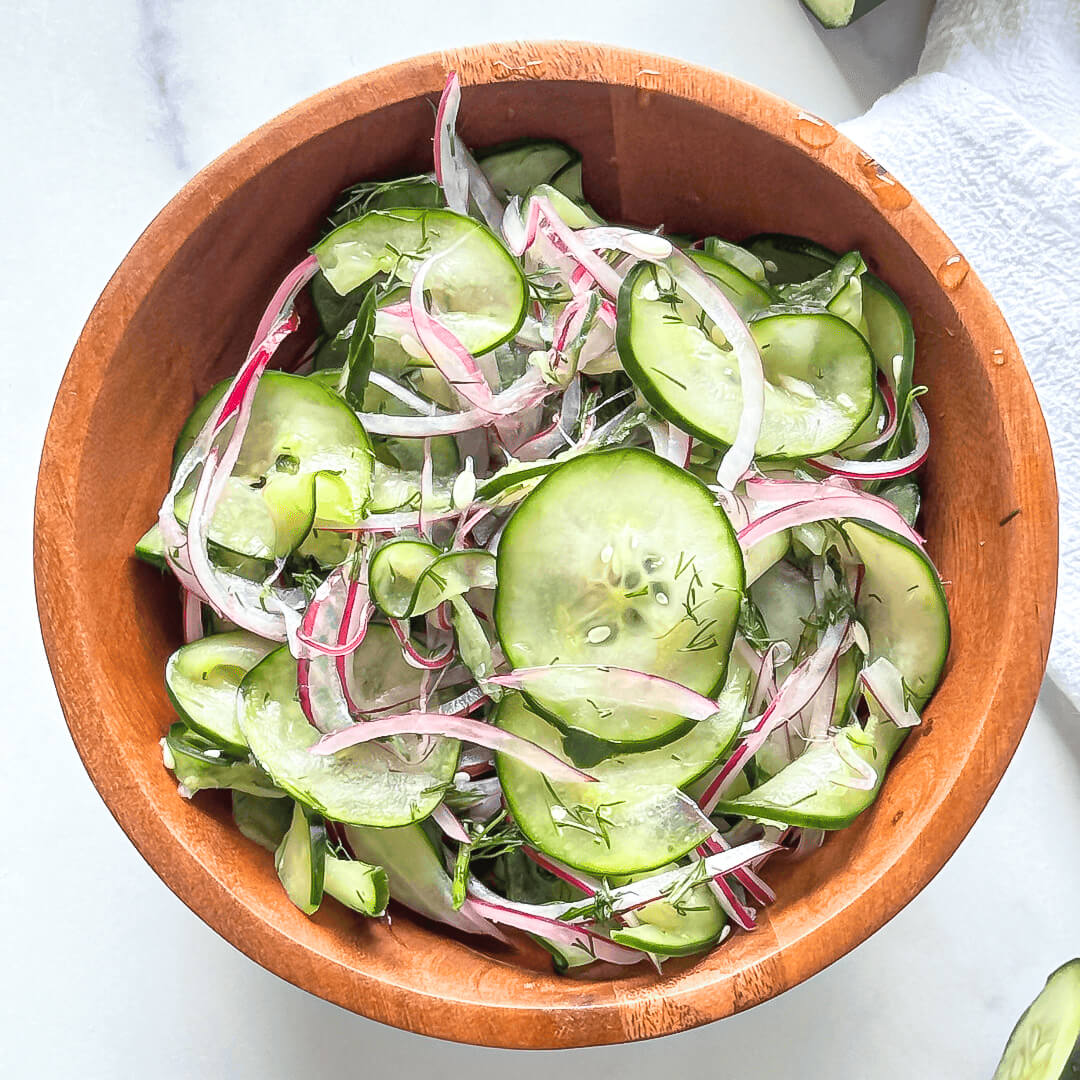 Photo of Cucumber Dill Salad in a wooden bowl