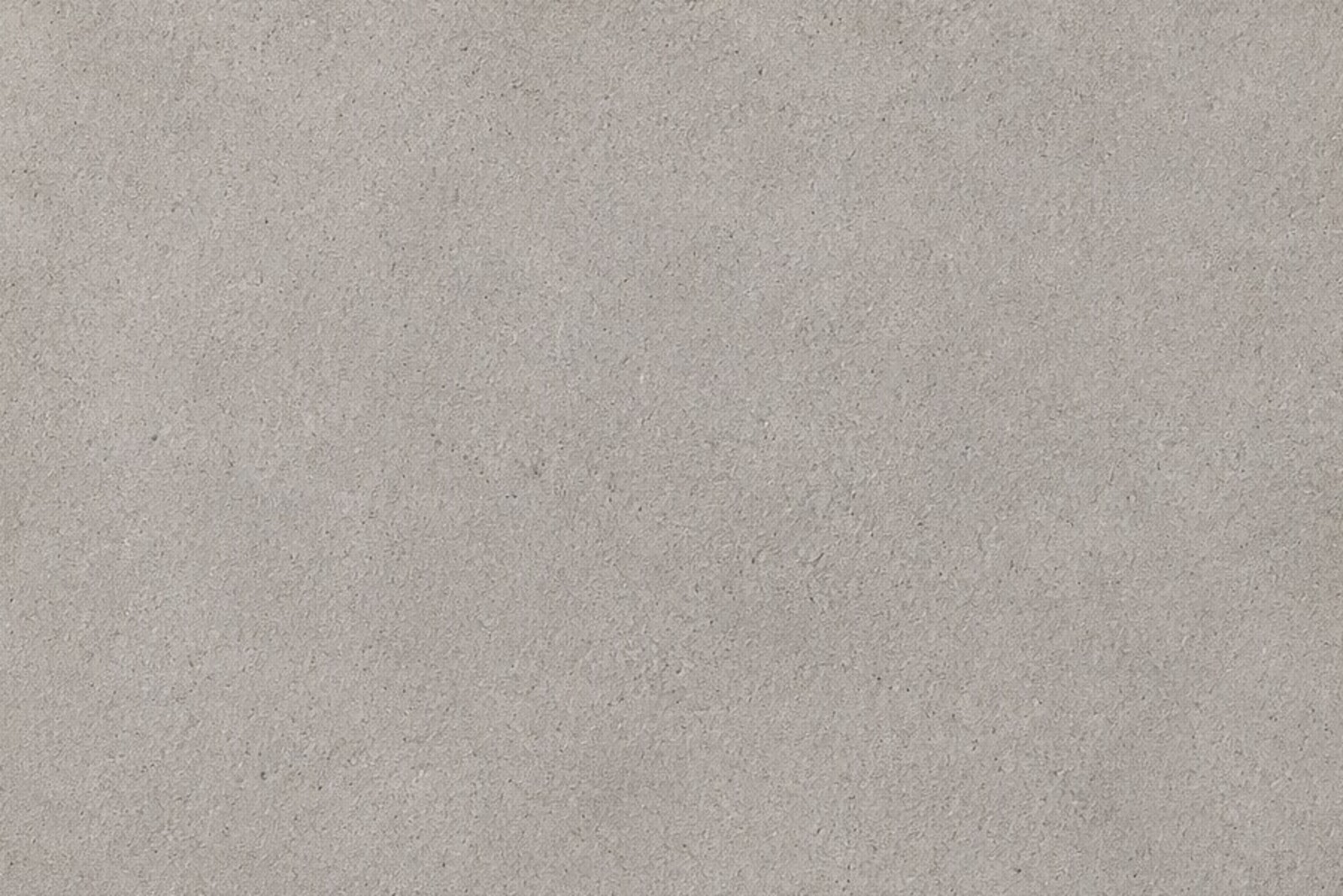 Full-frame crop of the pale grey residential driveway concrete finish
