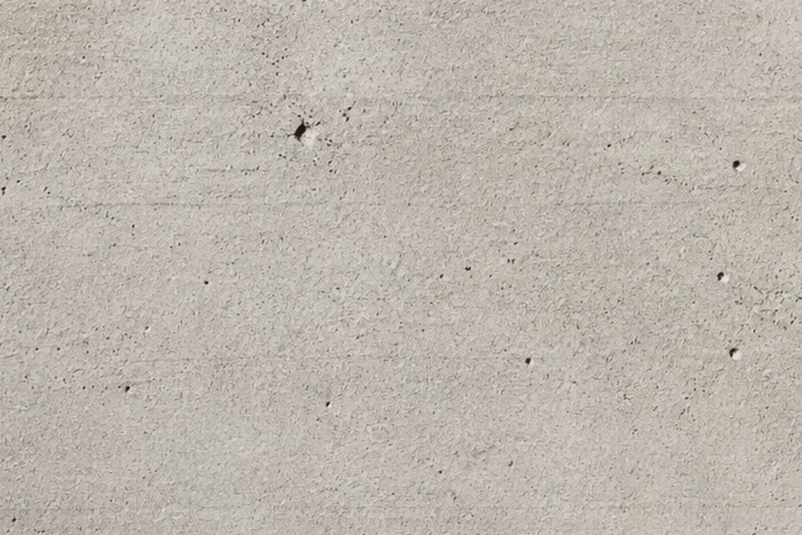 Full-frame crop of the pale structural poured concrete finish
