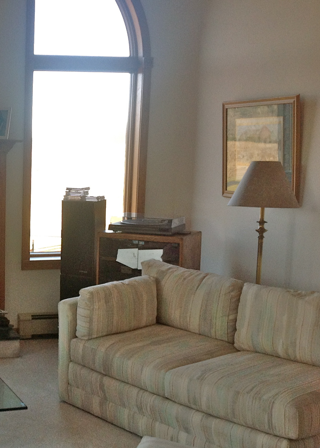 Remember those "push in the glass and the door opens" entertainment units? The one in the corner was removed.