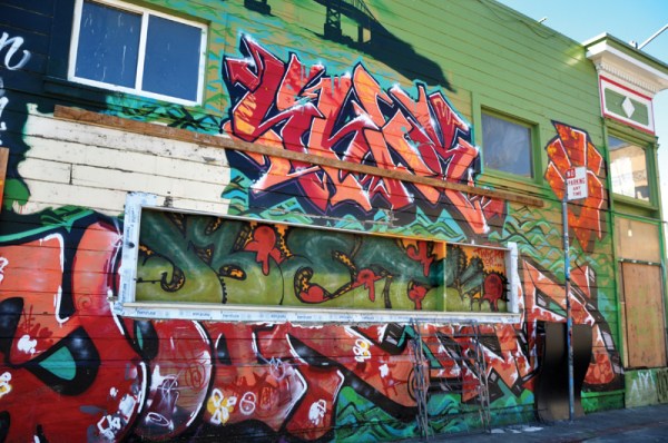 The window that cut through the mural was on the side of the building at 3325 24th St. that faces Osage Alley. The names cut out were not of dead children. Instead, they were the names of graffiti artists "Yoak" and "Rave." Both of them are a live and well. Photo Armando Valdez