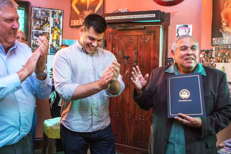 Westside Observer Publisher Mitch Bull and Ingleside Light Publisher Alex Mullaney present Juan Gonzales with a certificate of honor signed by San Francisco Mayor Edwin M. Lee for Gonzales' 30 years of service as a journalism instructor at City College. The San Francisco Neighborhood Newspaper Association hosted the event on March 20 at Randy's Place on Ocean Avenue. Photo Nathaniel Y. Downes