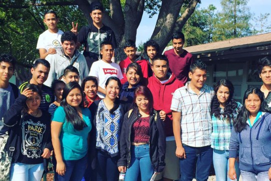 Founder and CEO of DREAMers Roadmap Sarahi Espinoza Salamanca (bottom center) poses with Mountain View High School students after giving a presentation. Salamanca created a website and mobile app that provides access to college scholarships for DREAMers and undocumented students. Courtesy of DREAMers Roadmap