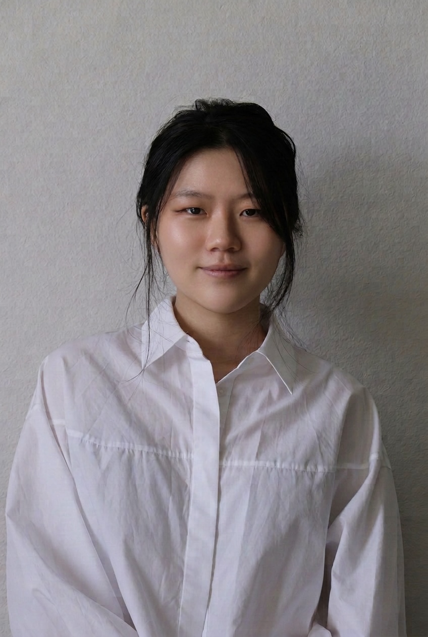 image of Pei-Chi, an asian woman with black hair, smiling, wearing a white shirt
