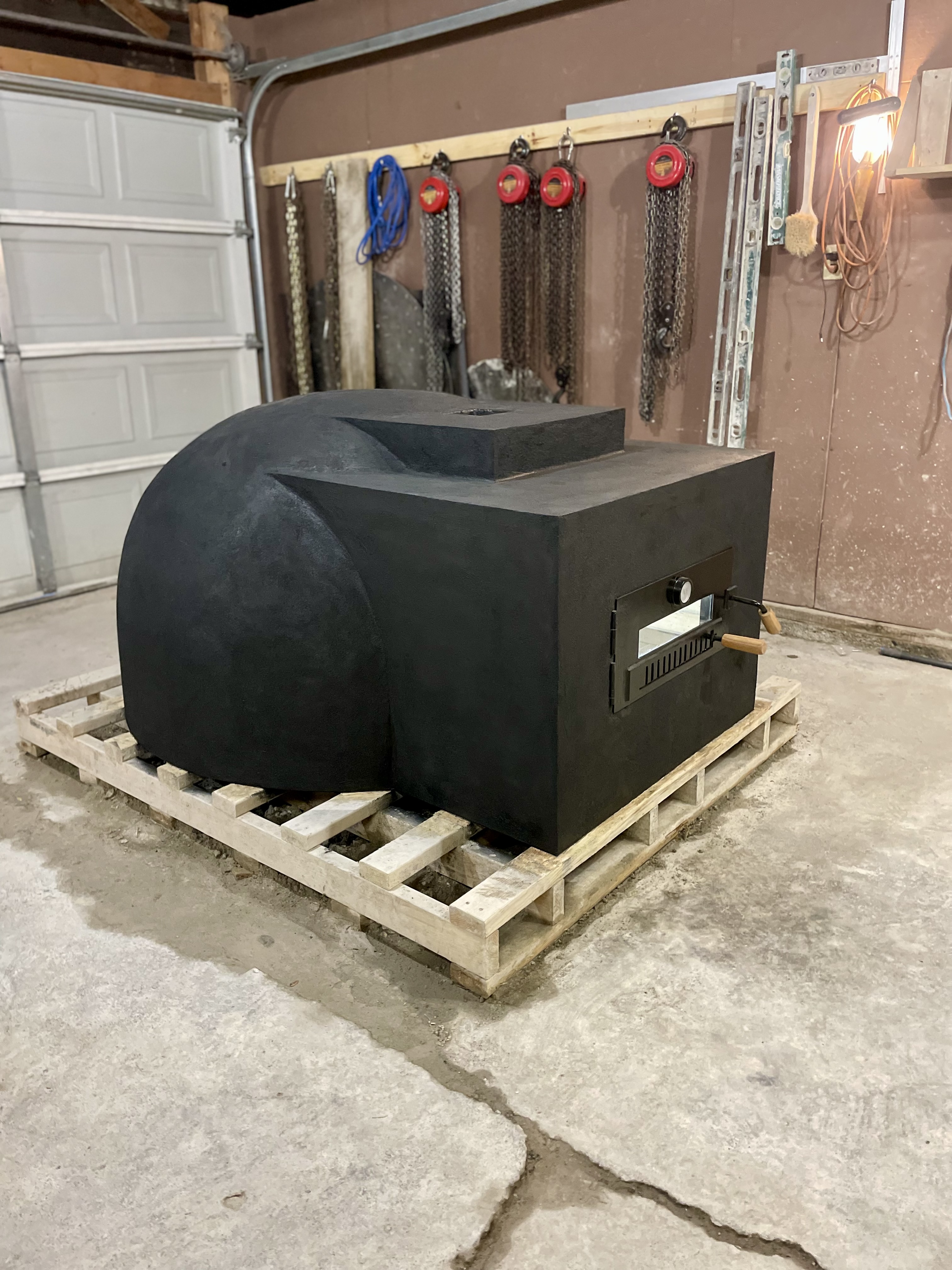 Wood fired pizza oven for sale. The pizza oven is compatible with pallet forks allowing it to be transported and installed with ease. 24"-48" pizza ovens available. Custom orders accepted.