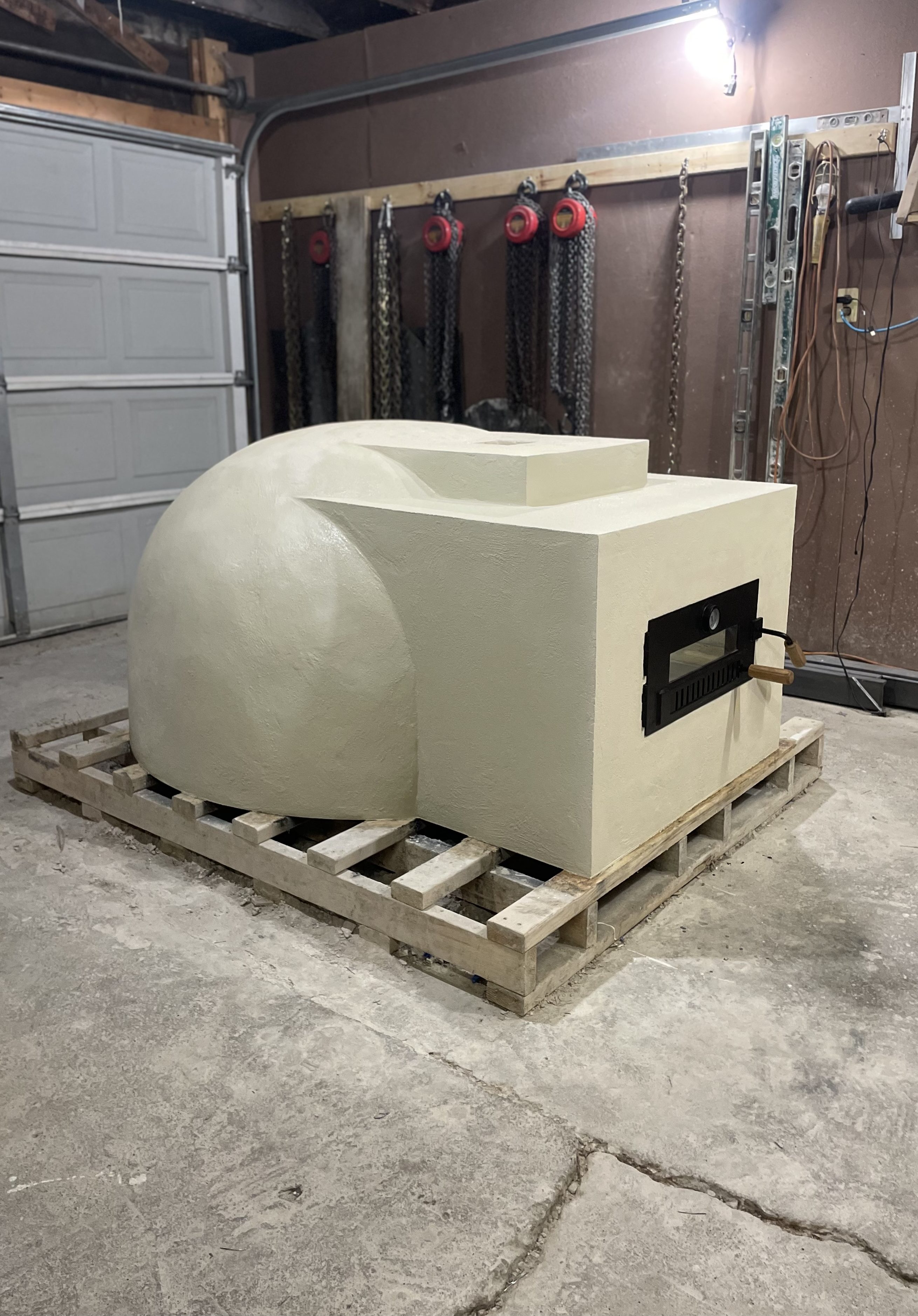 Wood fired pizza oven for sale. The pizza oven is compatible with pallet forks allowing it to be transported and installed with ease. 24"-48" pizza ovens available. Custom orders accepted.