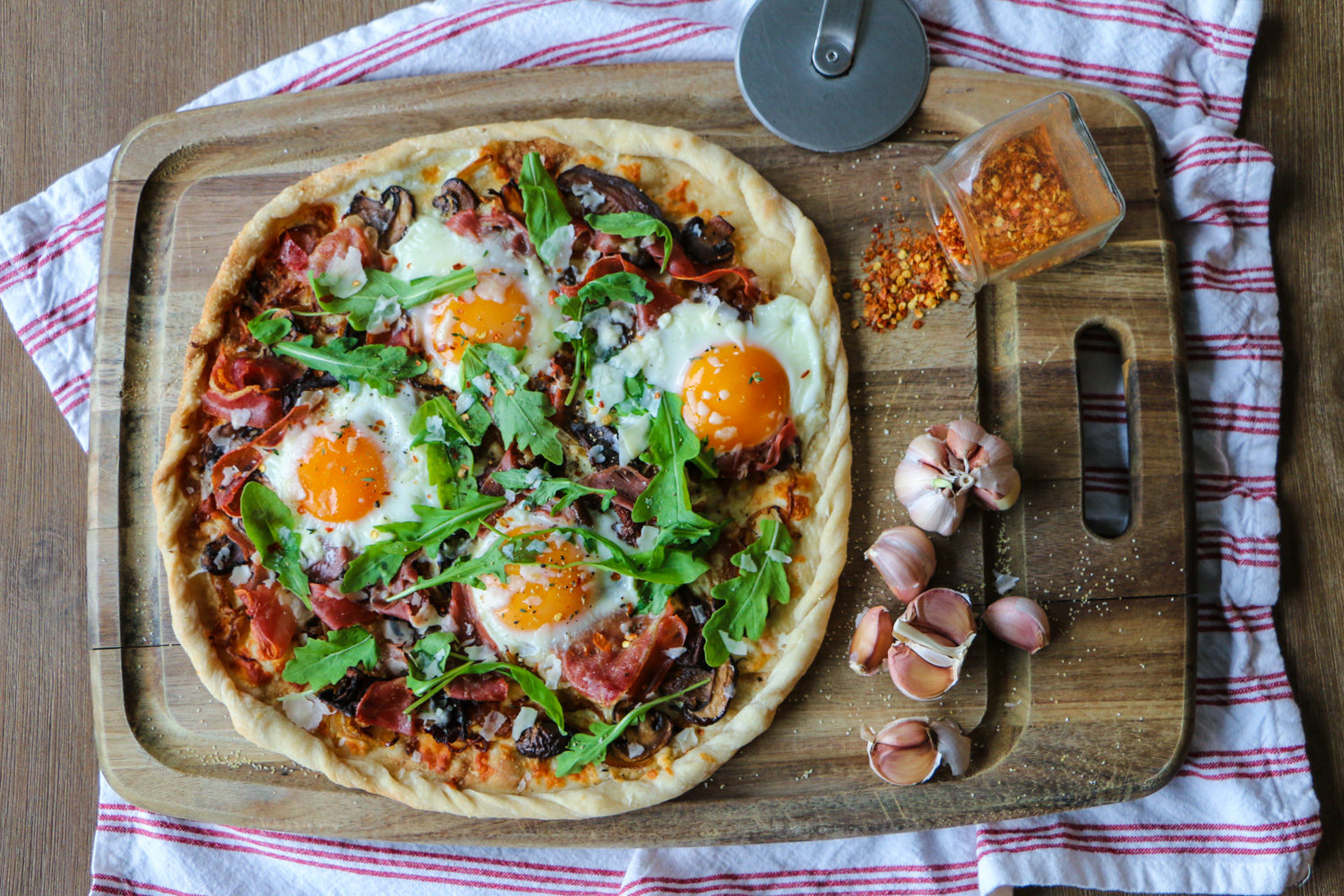 pix Arugula Prosciutto Pizza With Egg breakfast pizza with crispy prosciutto caramelized onions mushrooms arugula