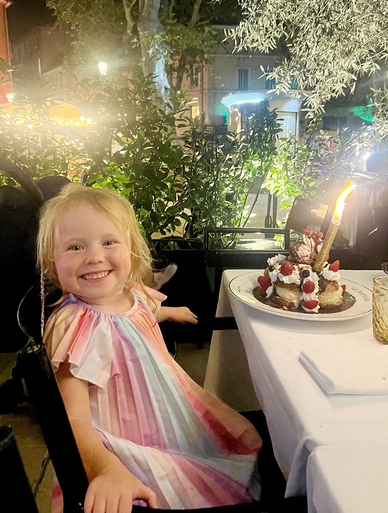 Lottie with a giant profiterole tower at La Rotonde, Aix-en-Provence