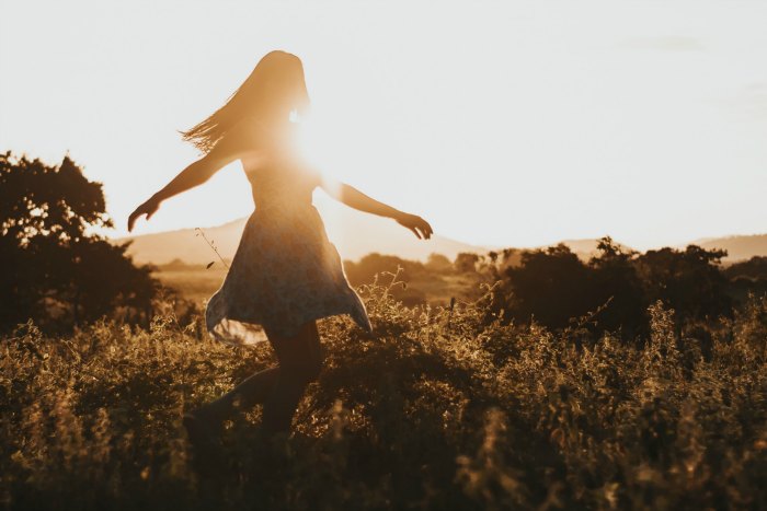 girl dancing in the sun