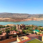 Bin El Ouidane lake surrounded by mountains during grand rabat itinerary