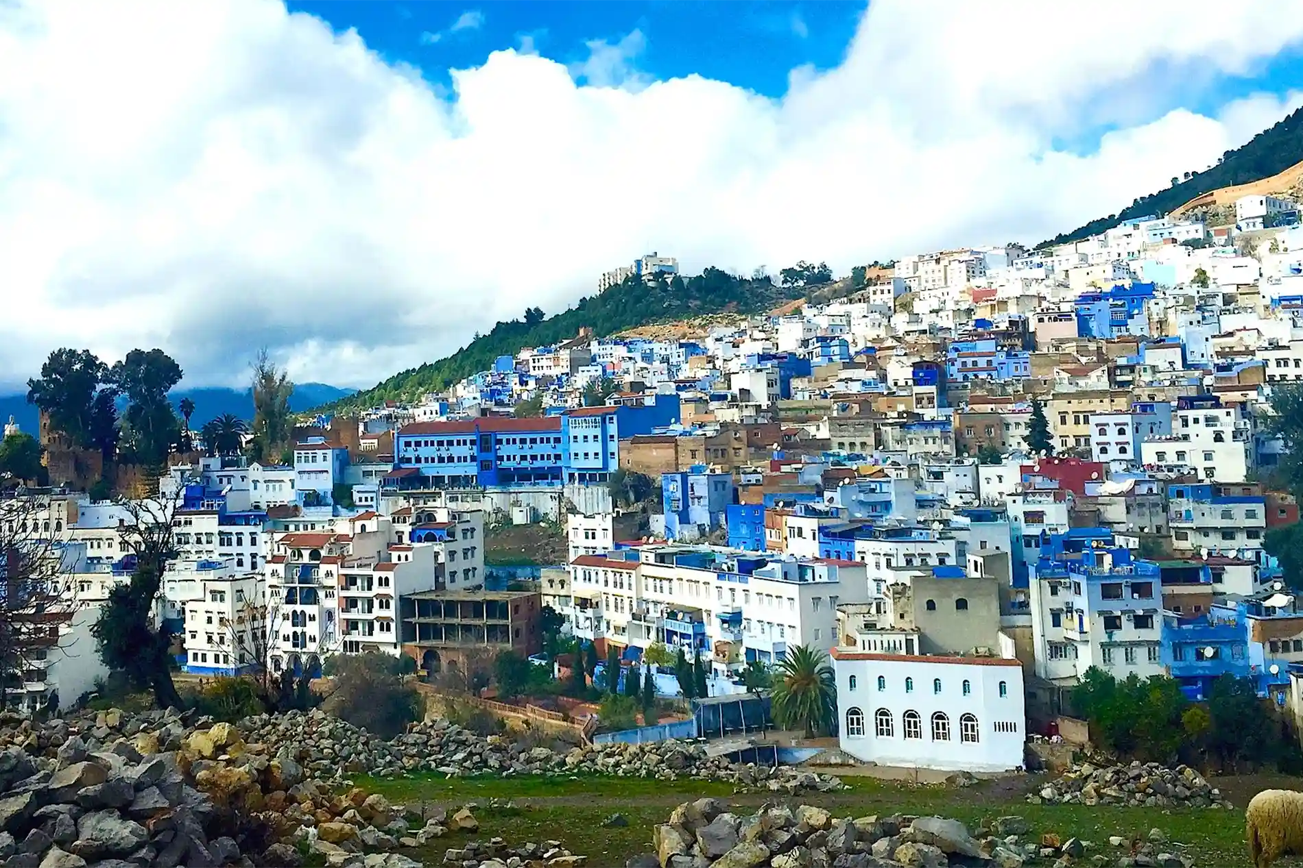 Blue Town with clouds during Fez Chefchaouen adventure