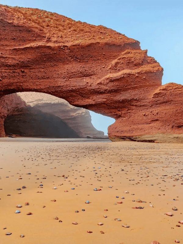 Legzira beach near the huge red cliff during Dakhla Atlantic Adventure