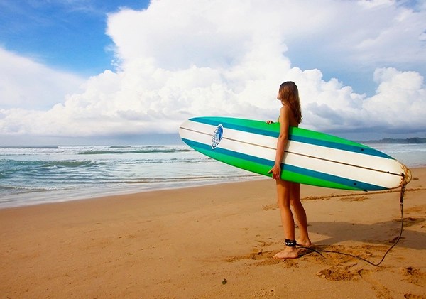 surfing on atlantic ocean during an adventure in Morocco