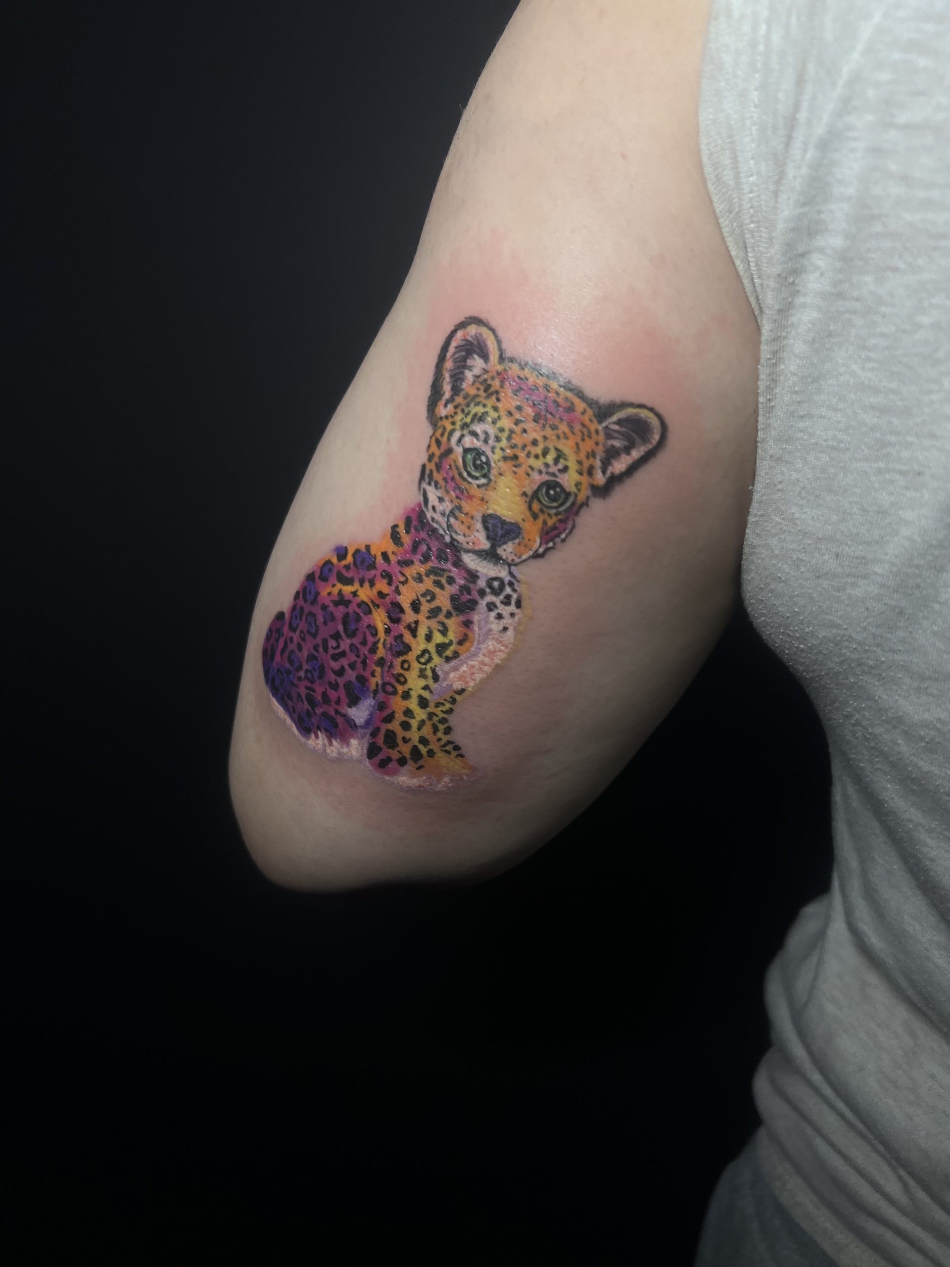 Colorful Baby Cheeta Cub Tattoo on Back of Upper Arm by Janell at EQ Tattoo in South Jersey