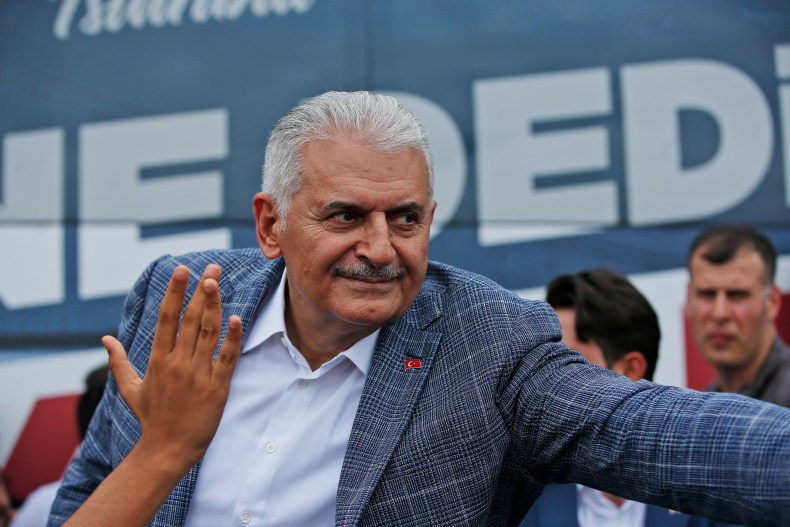 Binali Yildirim, mayoral candidate for Istanbul from Turkey's ruling Justice and Development Party, AKP, salutes supporters following a rally in Istanbul, Friday, June 21, 2019, ahead of June 23 re-run of mayoral elections. (AP Photo/Lefteris…