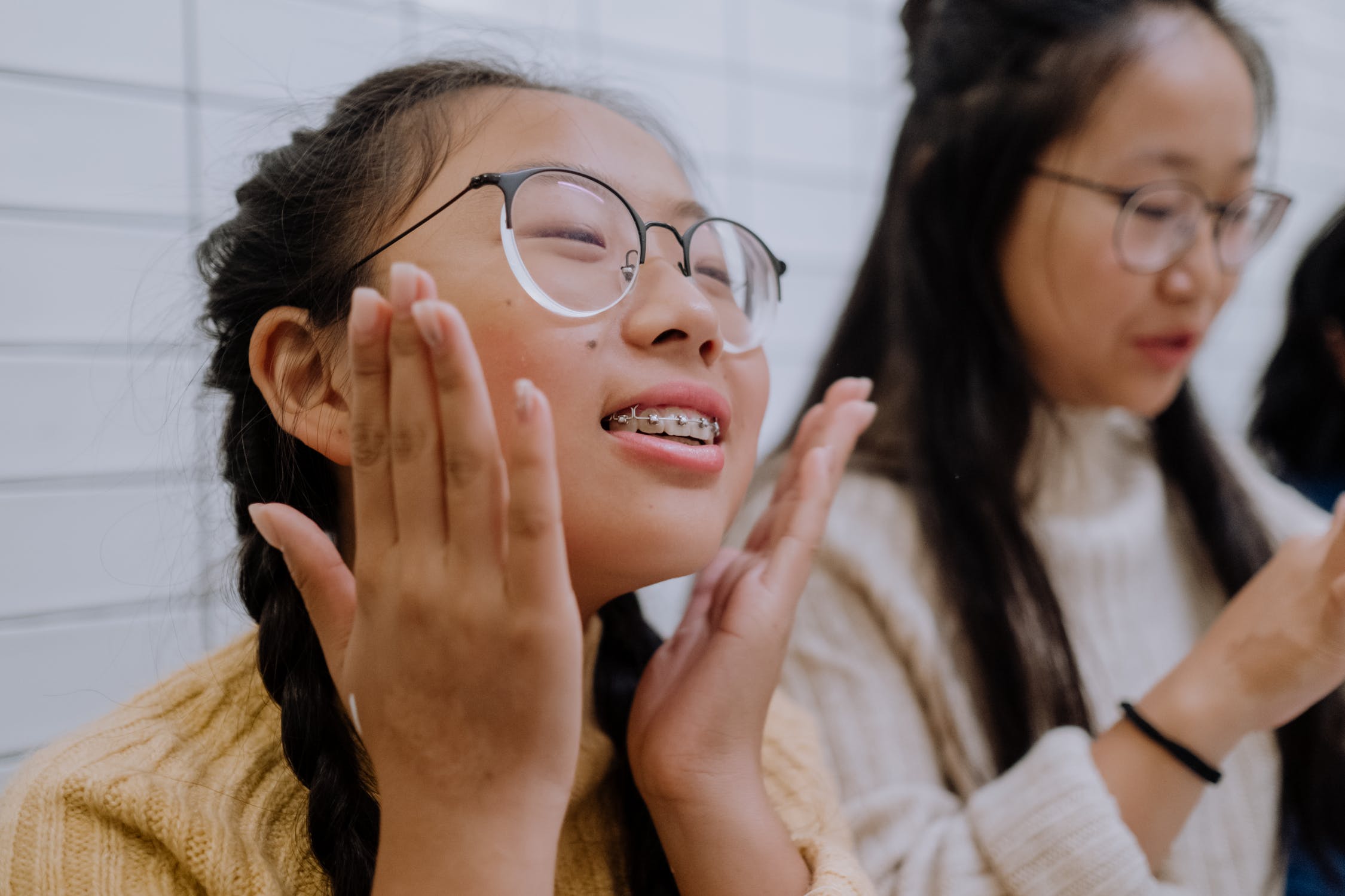Young teen with braces