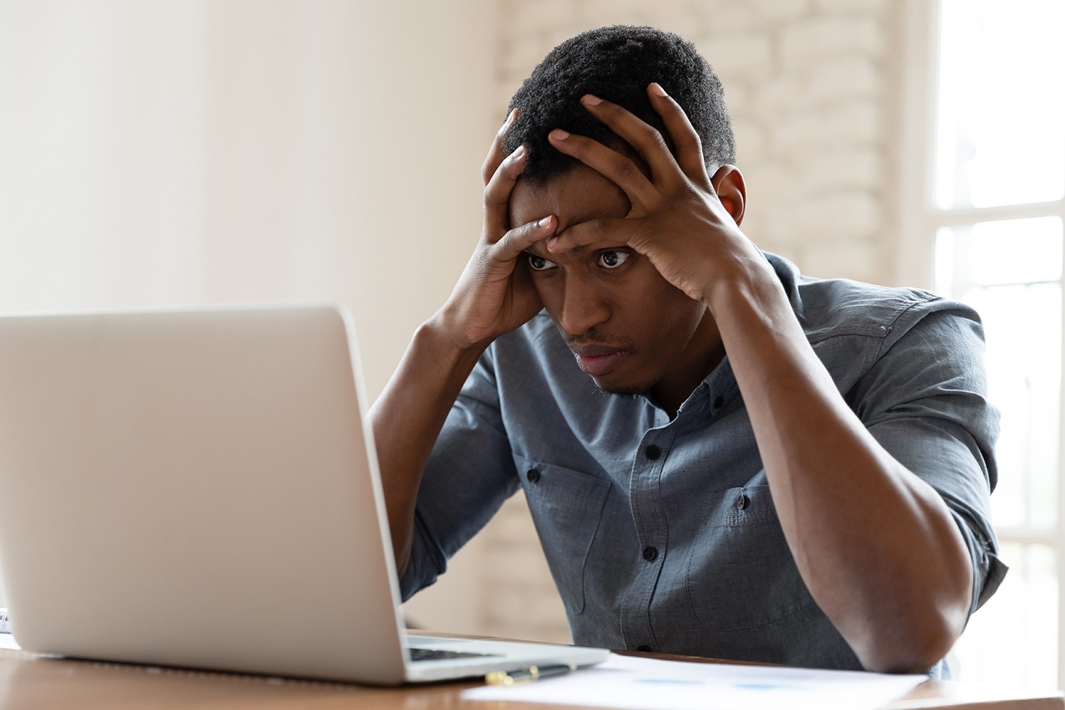 Images for boy staring the laptop with down head