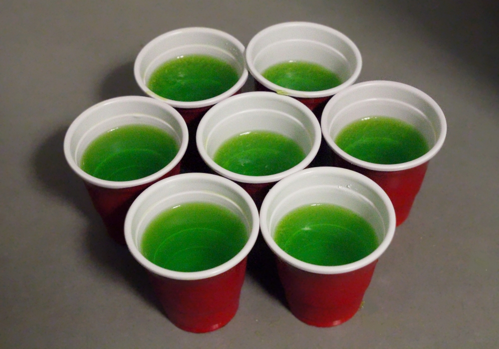 Jelly shots in cute little red cups.