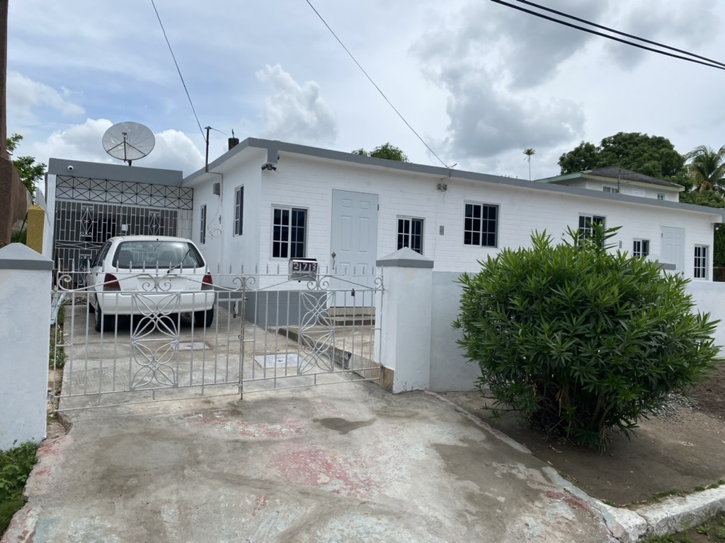 Stunning Villa Split into multiple Apartments For Sale In Spanish Town Jamacia