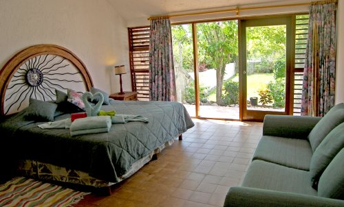 Maya Riviera home has beautiful bedrooms and patios