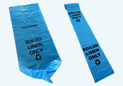 Blue soiled linen bag with fill line and printed recycling symbol for healthcare laundry collection.