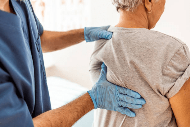 Senior Adult getting an exam for pressure injurys