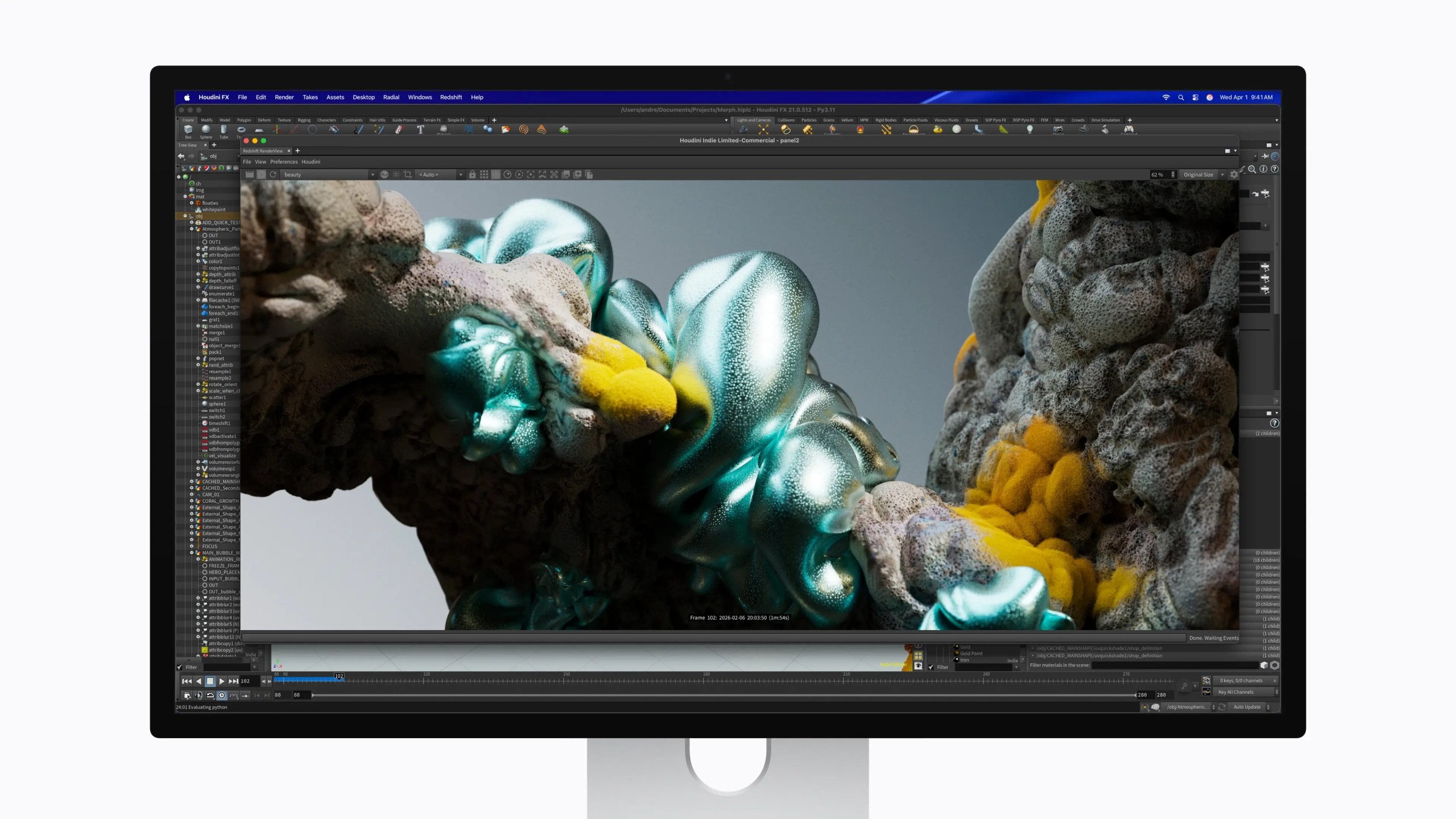 A computer monitor displaying a 3D rendering created with Houdini, featuring colorful organic shapes with metallic textures and complex surface details.