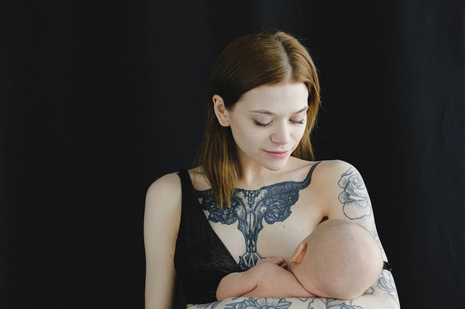 mother breastfeeding her child