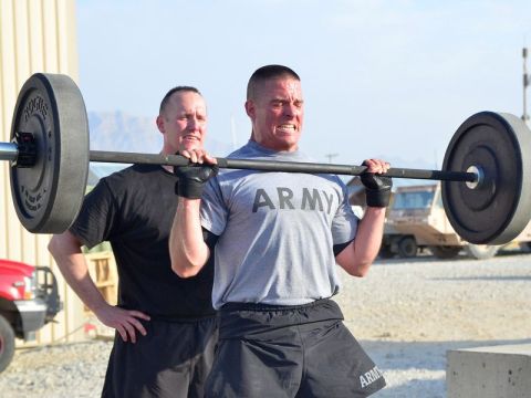 Man training with barbell