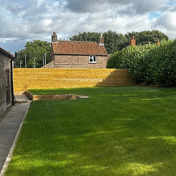 a turfed garden after receiving its first cut.