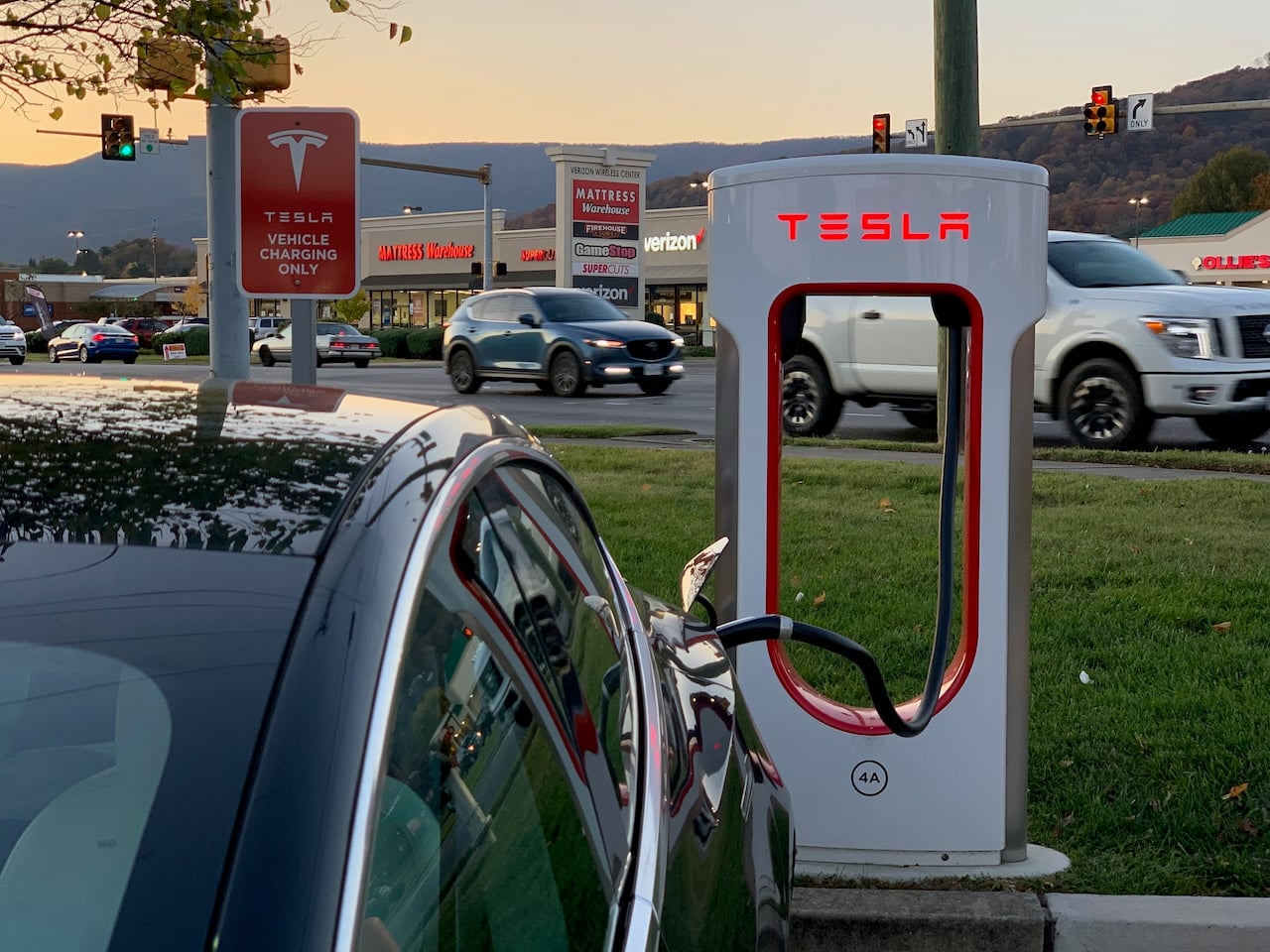 Ford and GM Spark Tesla's Charging Dominance. Tesla Model # Performance at a Tesla Supercharger location. Copyright EVXL.co