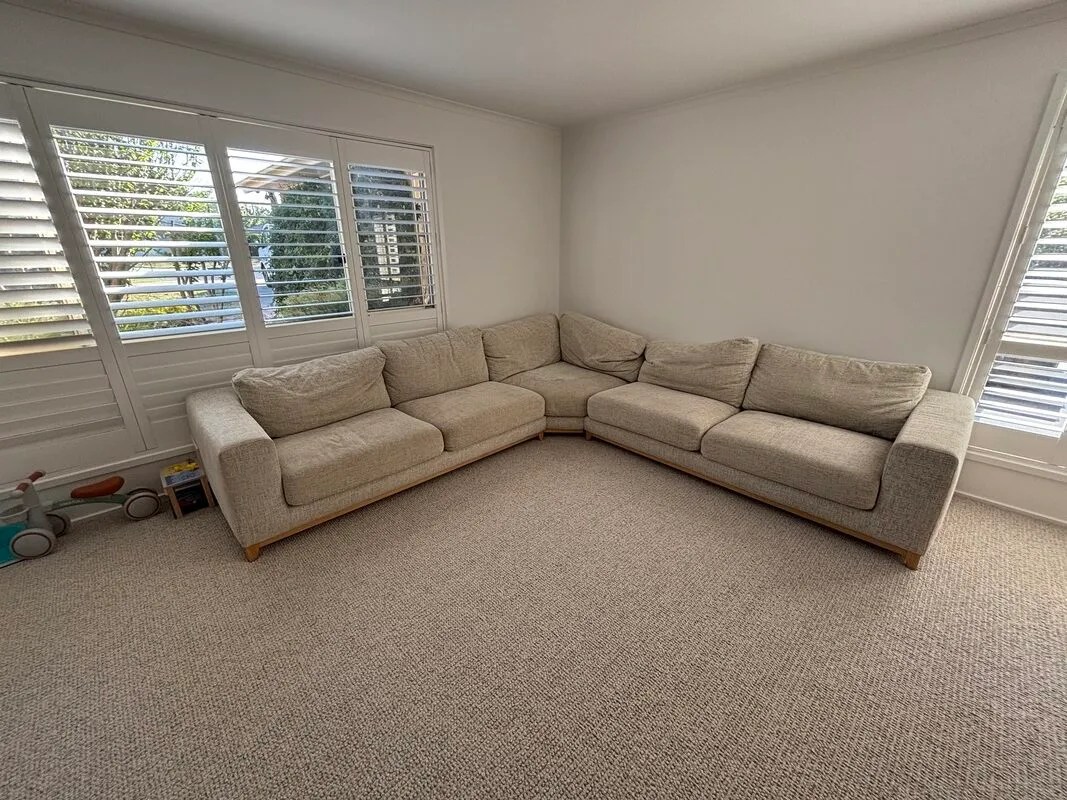 Before — family lounge upholstery cleaning in Monash ACT