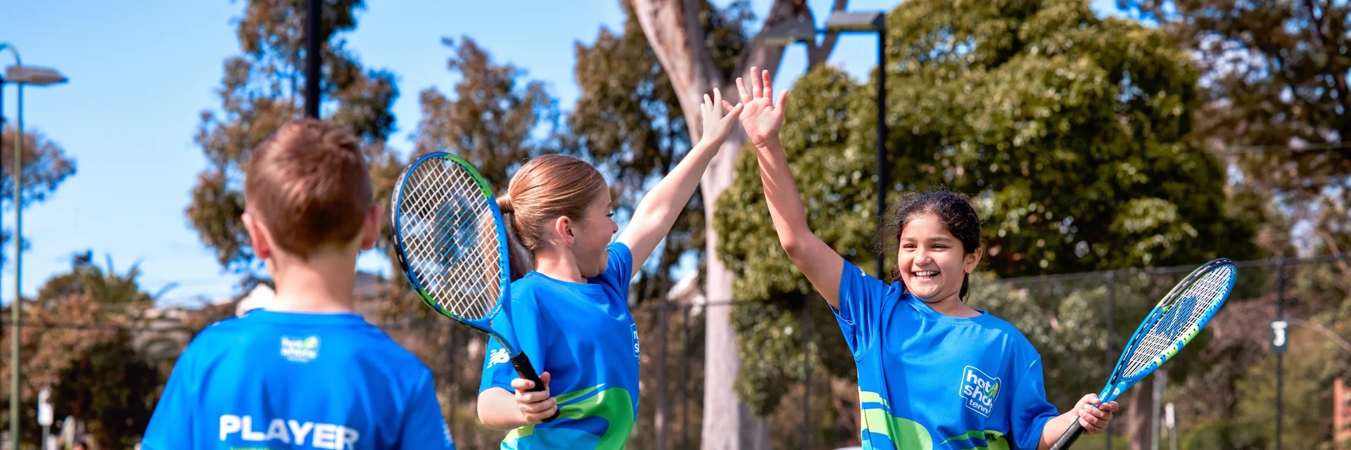 Group of kids at holiday tennis program