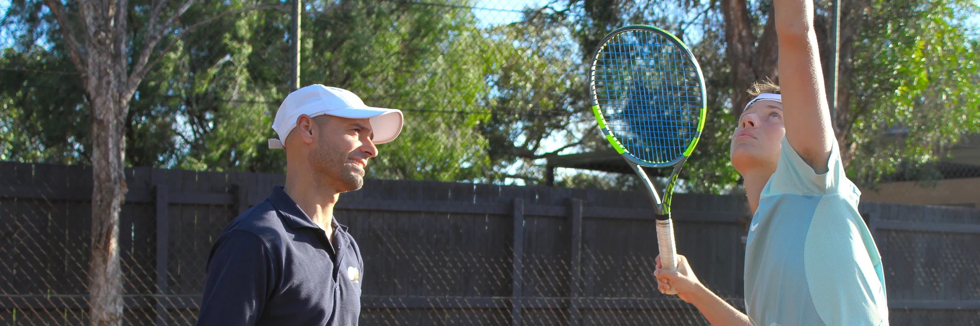 Marcus Petrou instructing player during private coaching session
