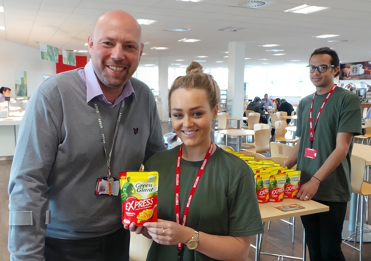 Executional staff running a workplace sampling position in an office atrium