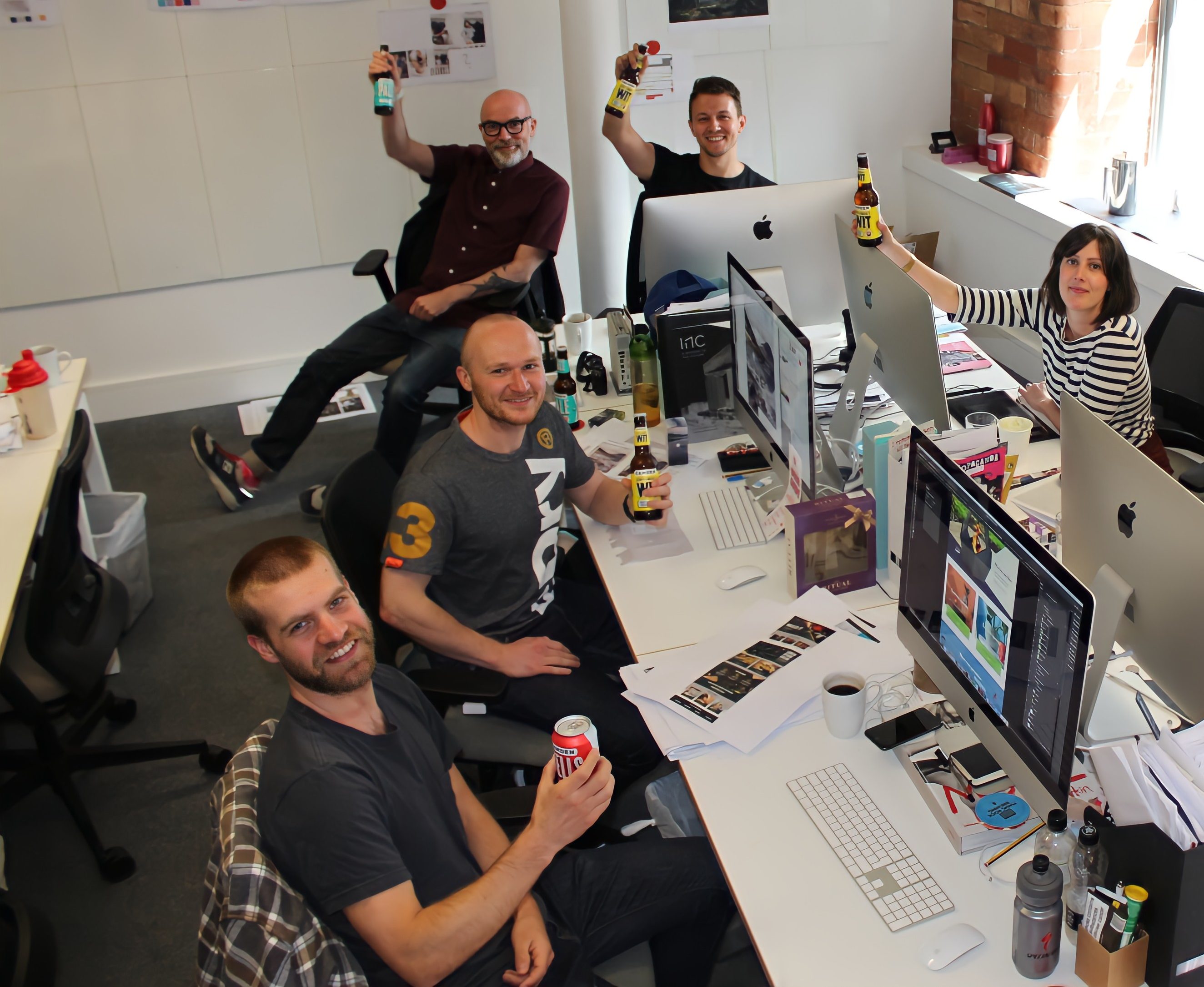 Executional team sampling products to office workers inside a workplace