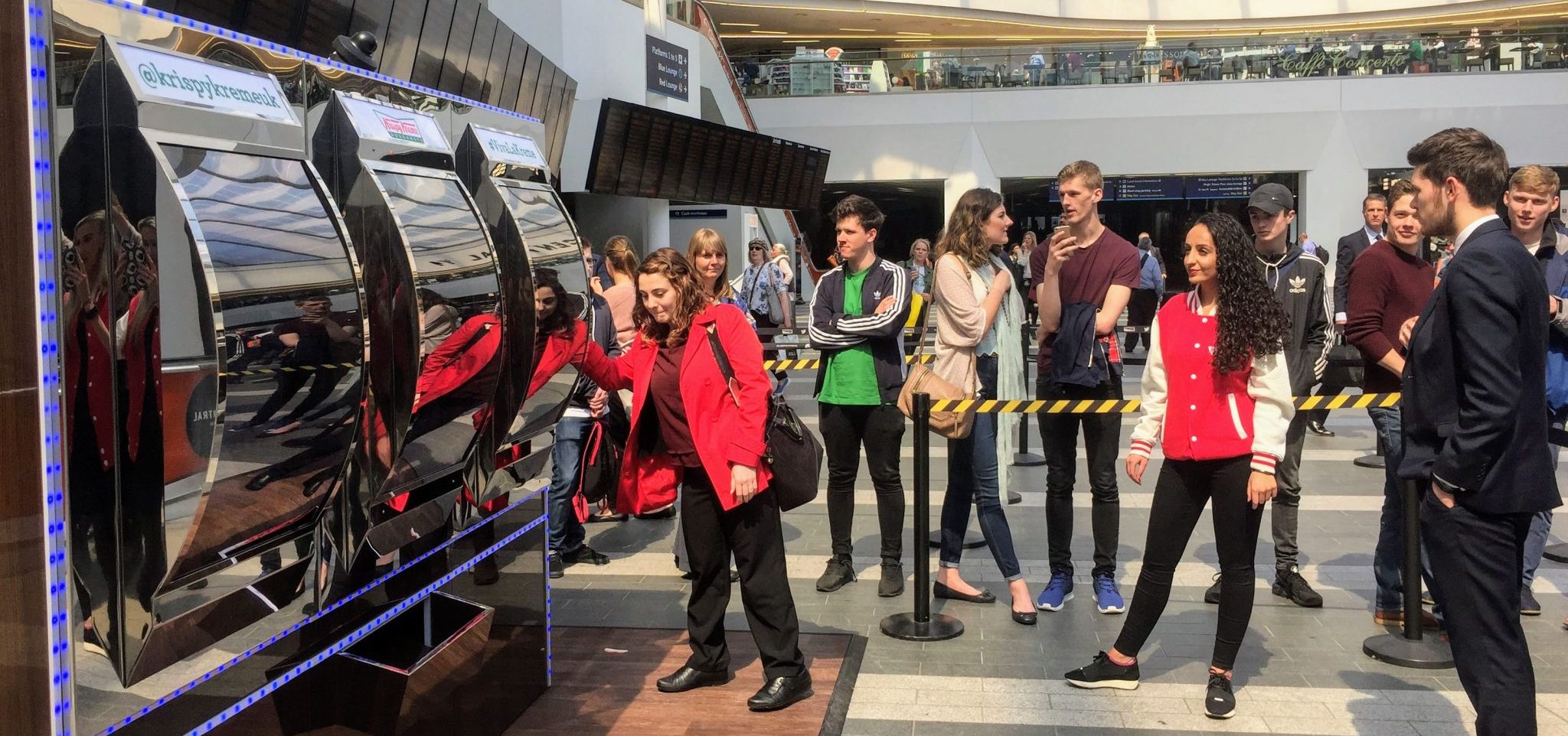 Executional branded sampling position set up inside a UK railway station