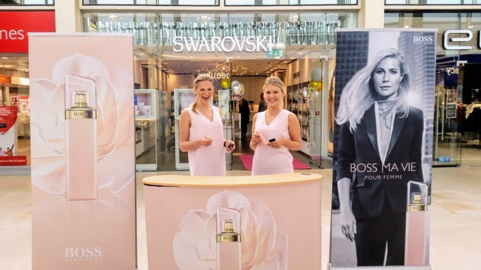 Executional staff running a Hugo Boss fragrance activation in a shopping centre